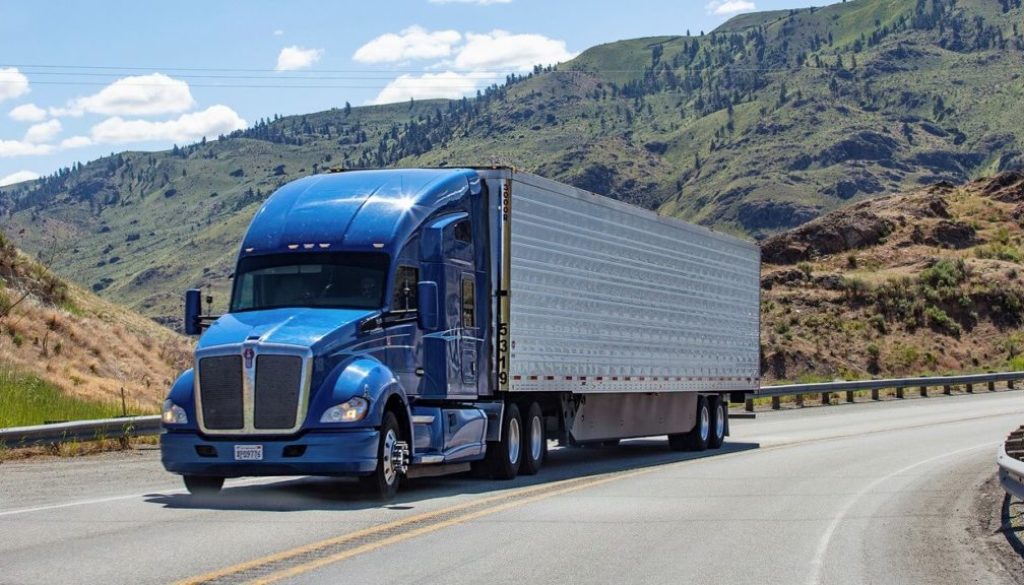 DCP CARDONA LLC tractor on a dedicated run